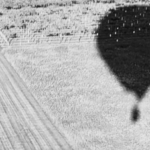 The shadow of a balloon in the middle of nowhere